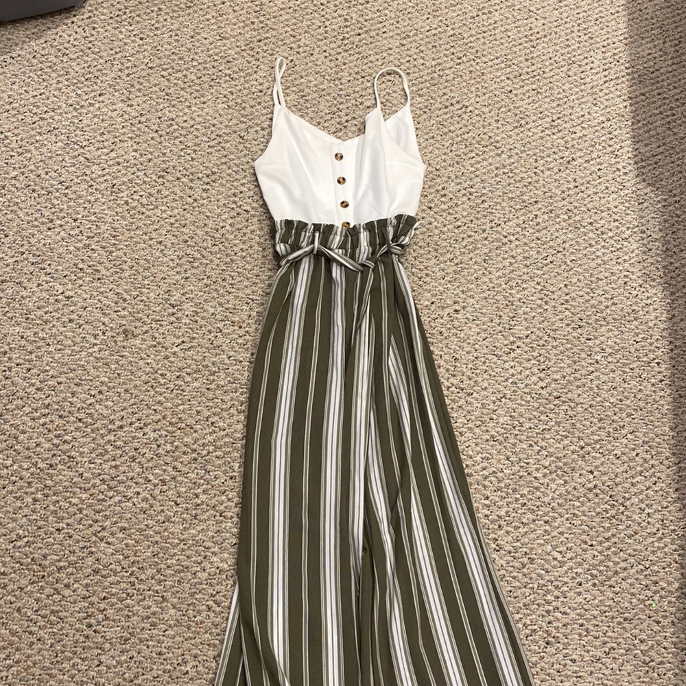 Francesca’s jumpsuit in size M. White top with green and white stripe pants.